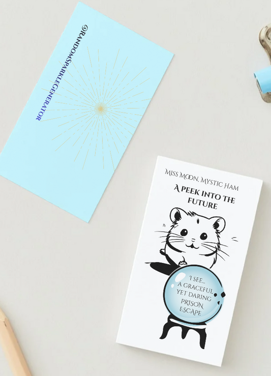 Card with a hamster in front of a crystal ball with text inside on a light gray surface
