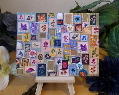 Postcard with a collage of botanical stamps on a small easel. The stamps show various plants and flowers.